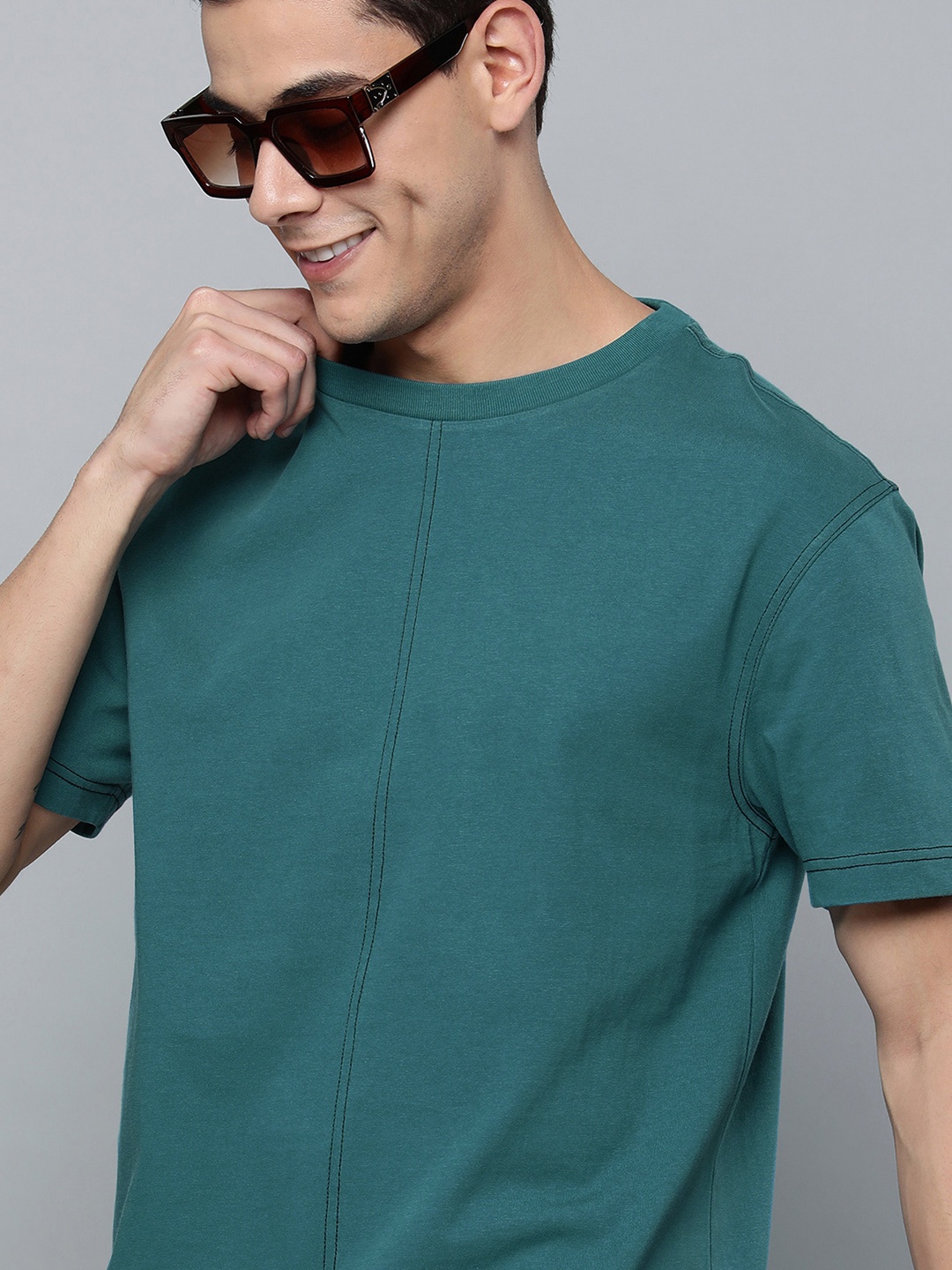 

Levis Men Teal Green Solid Pure Cotton T-shirt