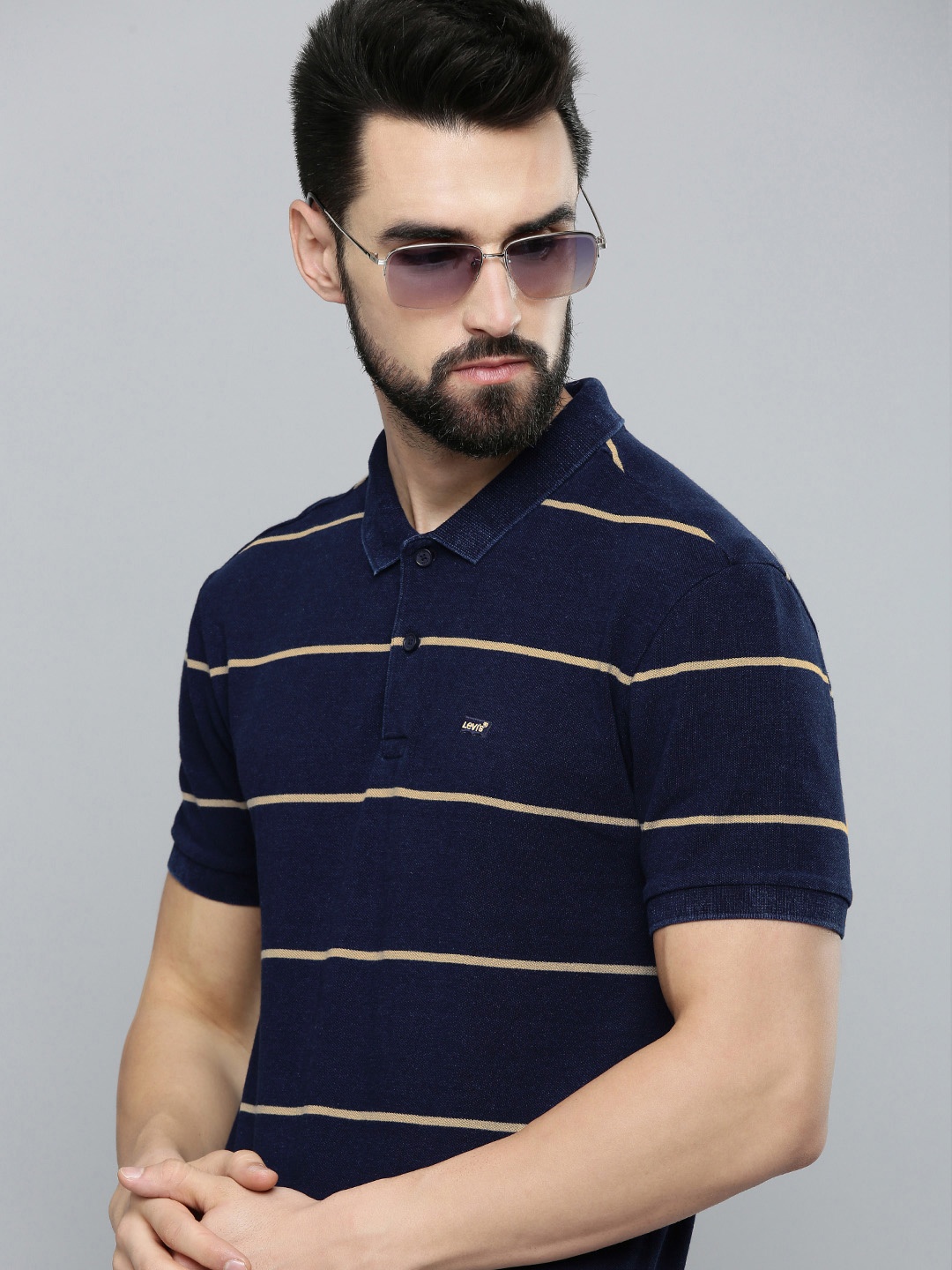 

Levis Men Navy Blue & Beige Striped Polo Collar Pure Cotton T-shirt