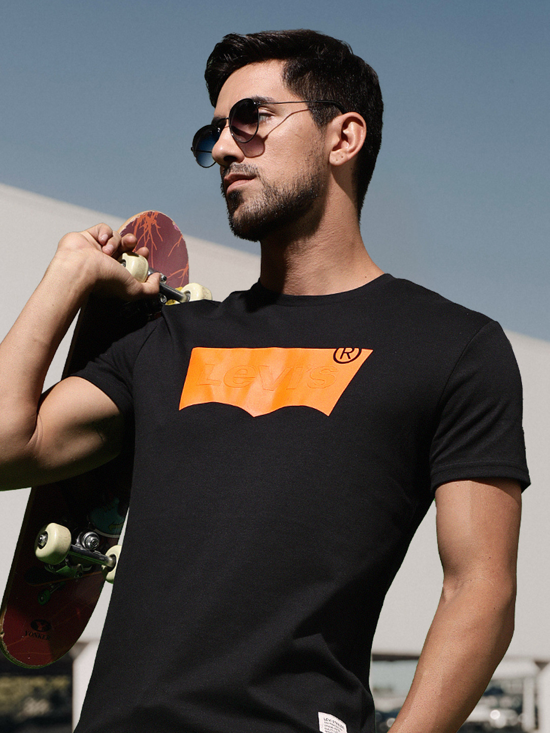 

Levis Men Black & Orange Brand Logo Printed Round Neck Regular Sleeves Applique T-shirt