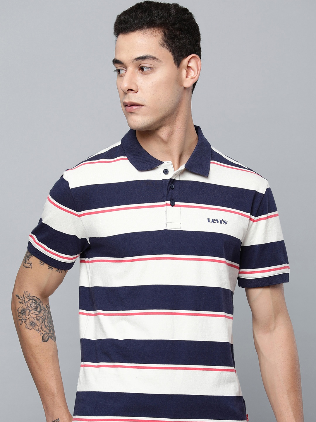

Levis Men Blue & White Striped Polo Collar Pure Cotton T-shirt
