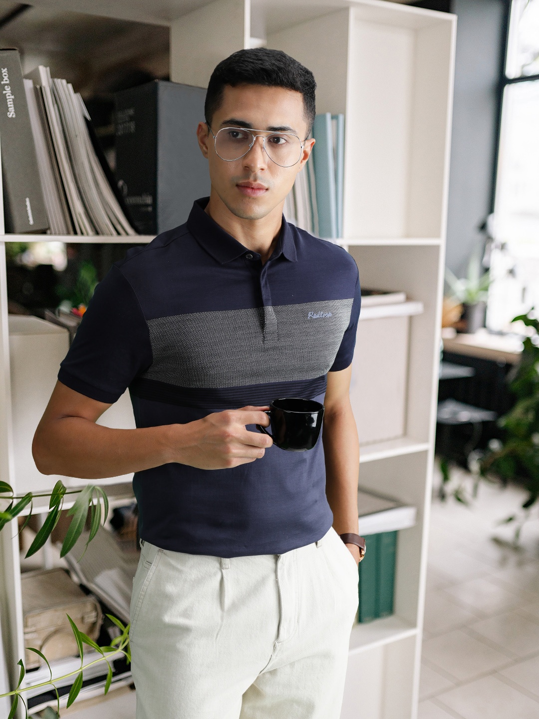 

Levis Men Blue & Black Colourblocked Polo Collar Pure Cotton Casual T-shirt