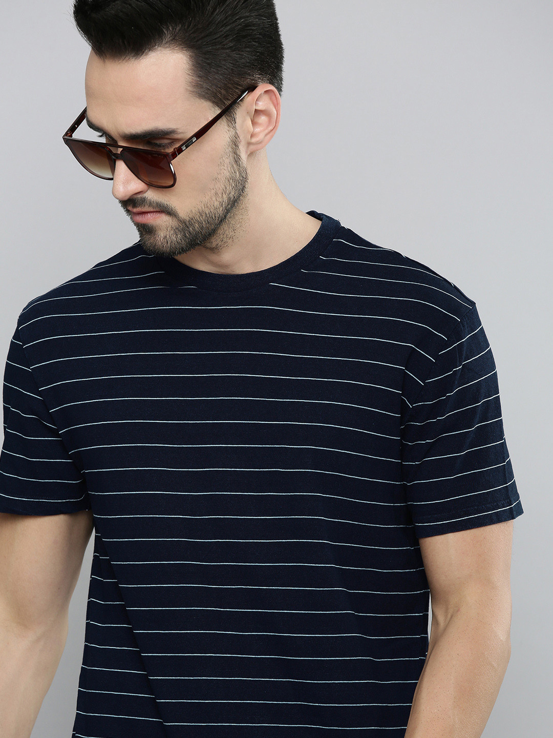 

Levis Men Navy Blue & White Striped Pure Cotton T-shirt