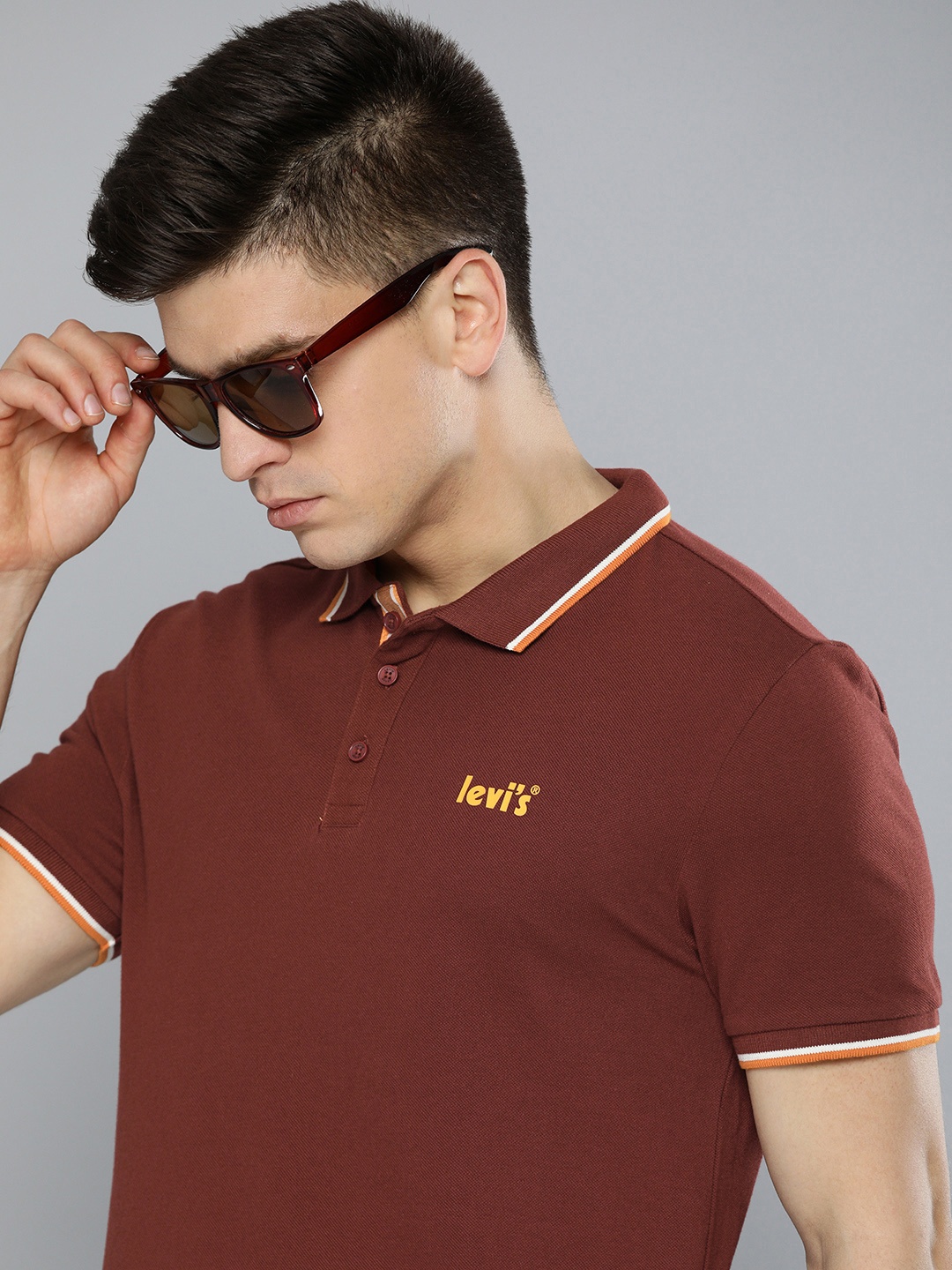 

Levis Men Maroon & Yellow Self Designed Polo Collar Pure Cotton T-shirt