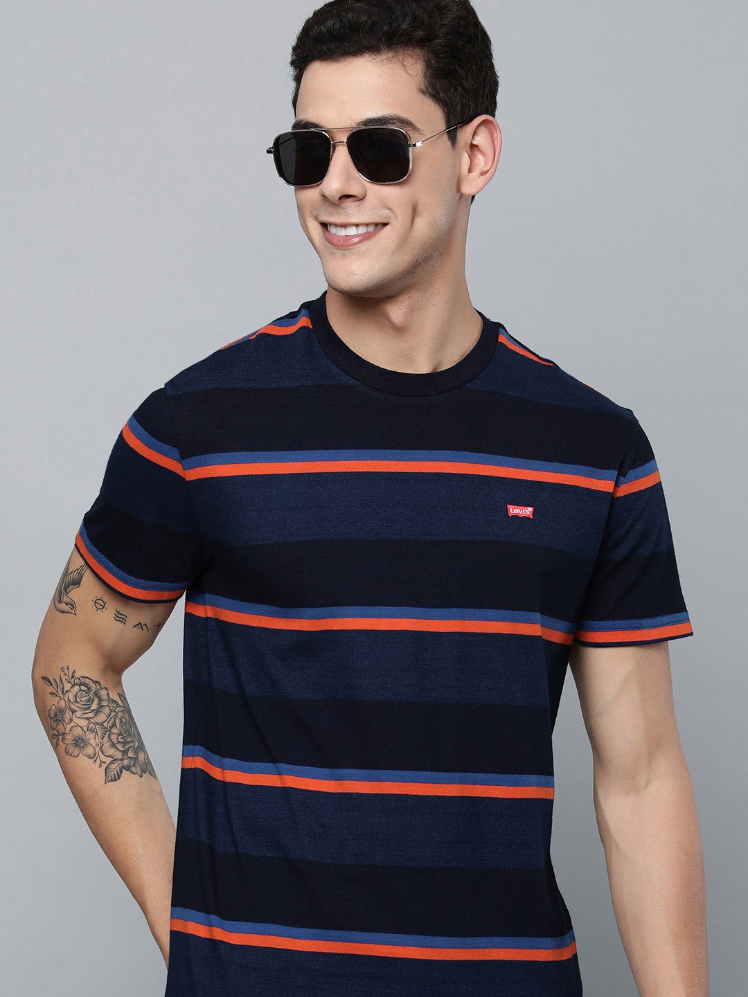 

Levis Men Blue & Orange Multi Or Variegated Striped Cotton Brand Logo Applique T-shirt