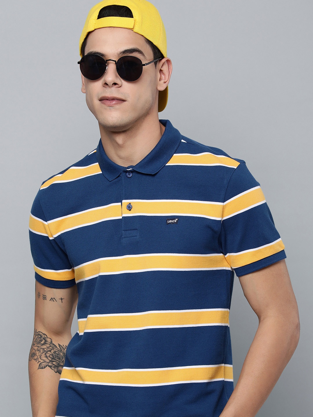 

Levis Men Blue & Yellow Striped Polo Collar Pure Cotton T-shirt
