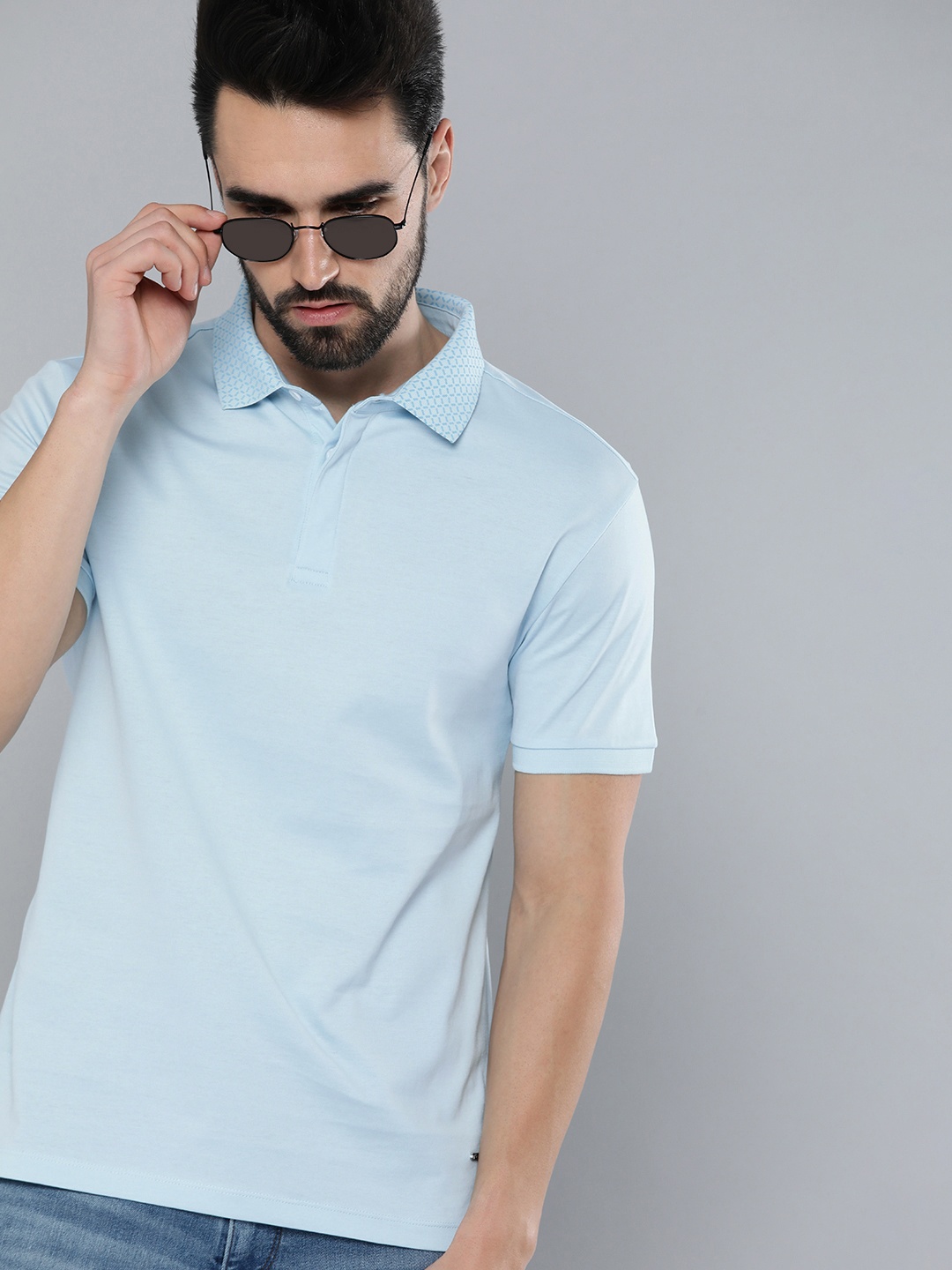 

Levis Men Blue Solid Polo Collar Pure Cotton T-shirt