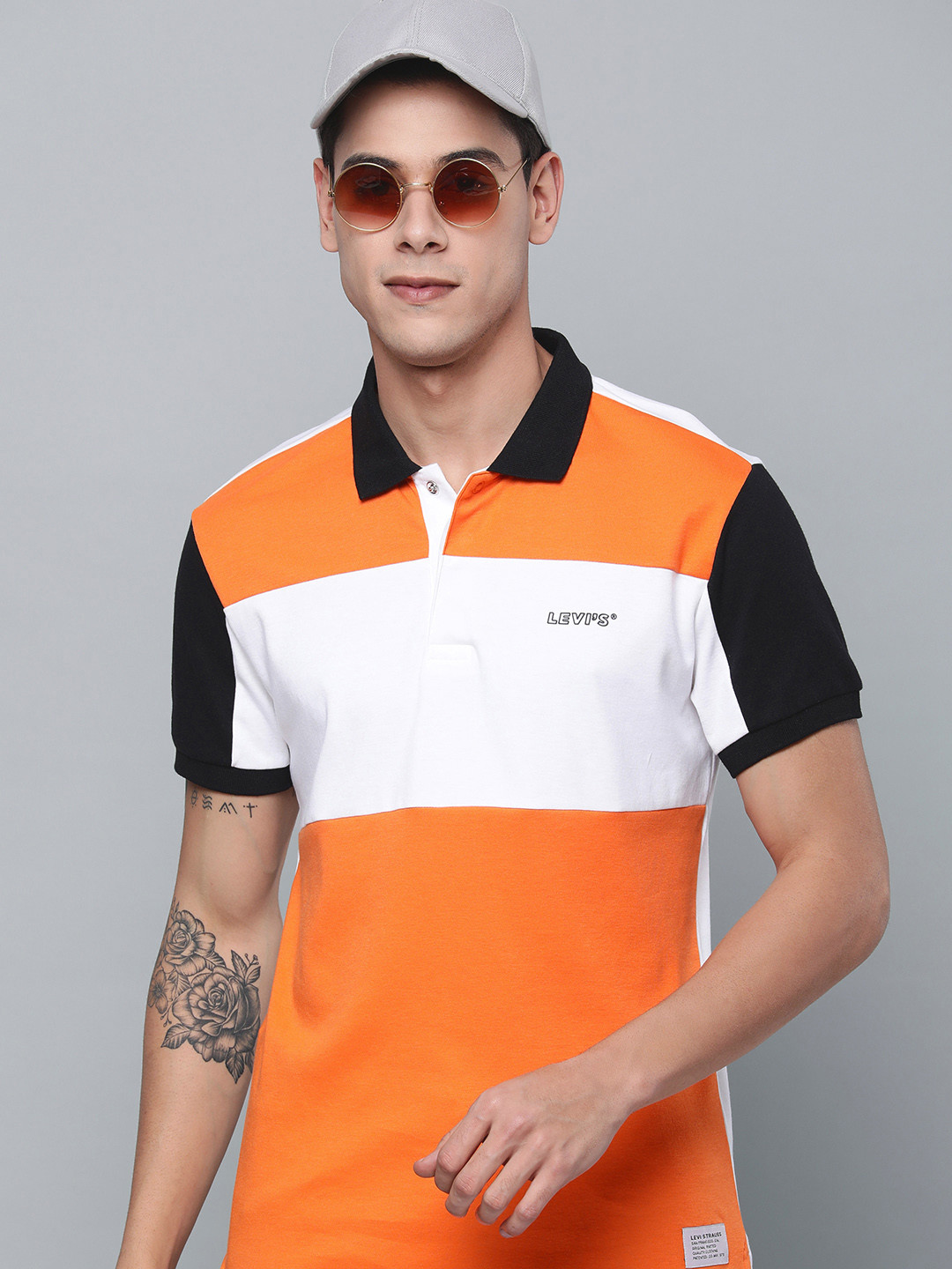 

Levis Men Orange & White Colourblocked Polo Collar T-shirt