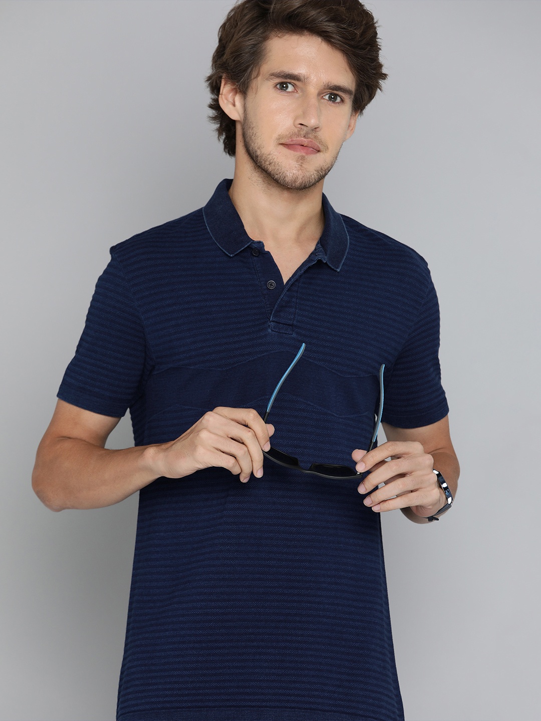 

Levis Men Navy Blue Striped Polo Collar Pure Cotton T-shirt