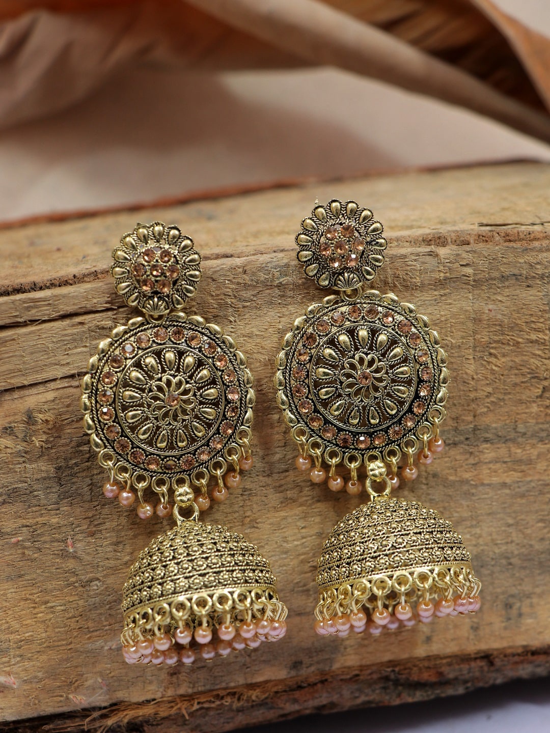 

Crunchy Fashion Gold-Plated & Peach-Coloured Dome Shaped Jhumkas