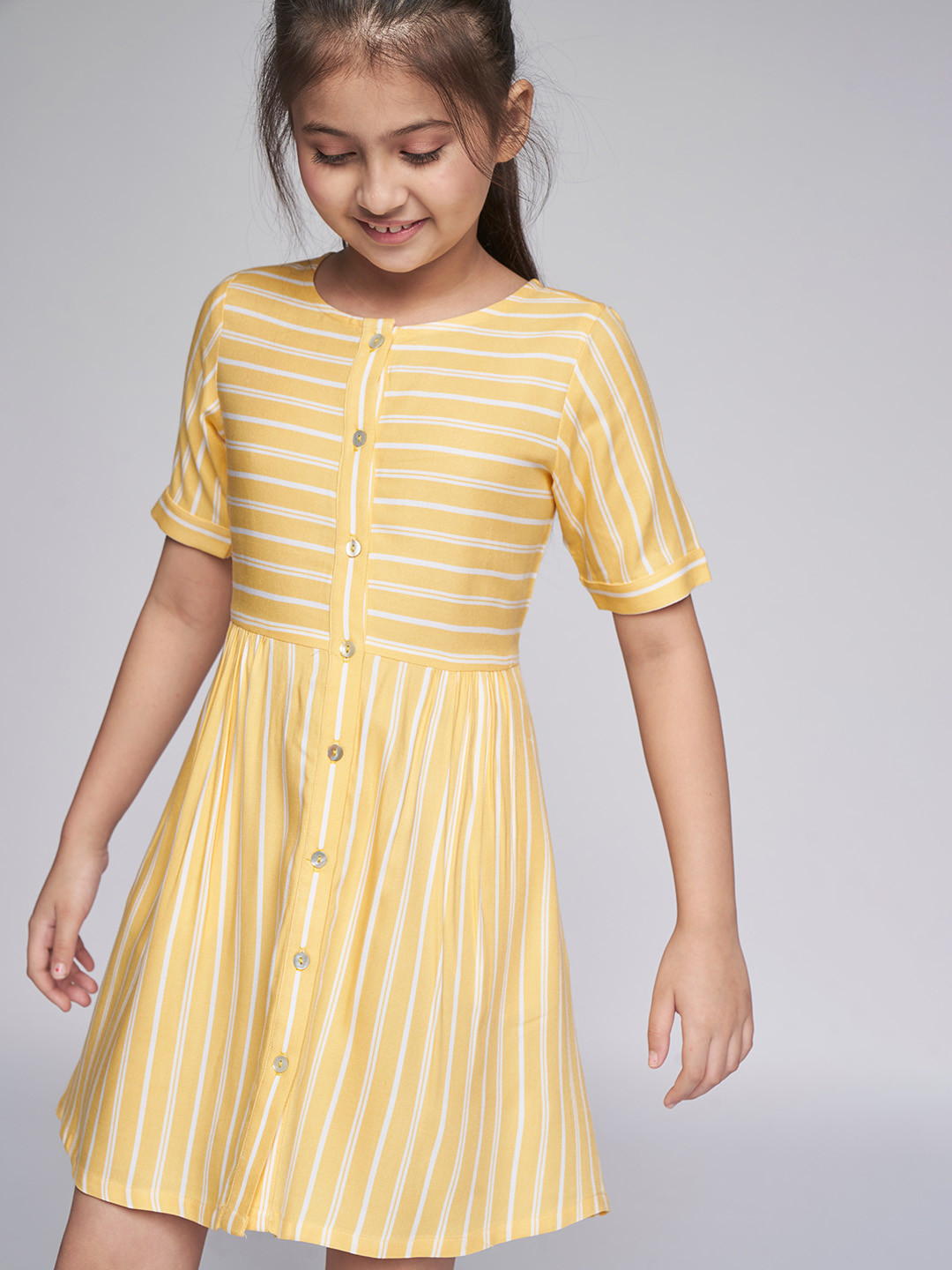 

AND Girls Yellow & White Striped Round Neck Regular Sleeves Pleated Rayon A-Line Dress