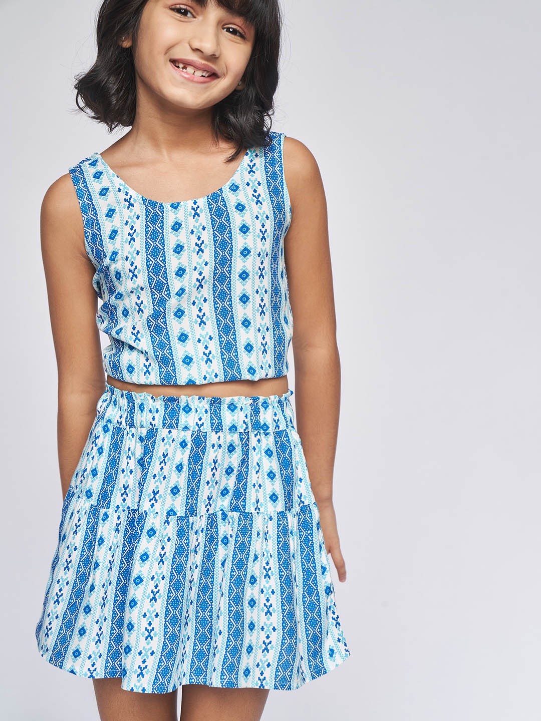 

Global Desi Girls White & Blue Printed Set of 2 Tops and Skirt
