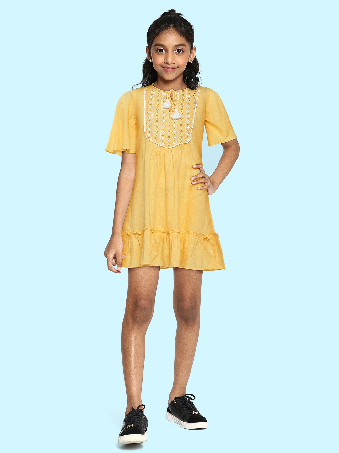 

Global Desi Girls Yellow Solid Pure Cotton A-Line Dress With Mirror Work