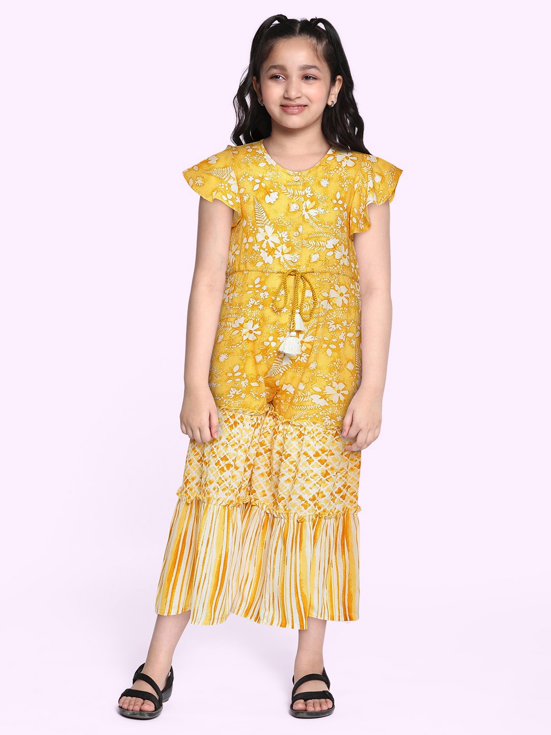 

Global Desi Girls Yellow Printed Basic Jumpsuit