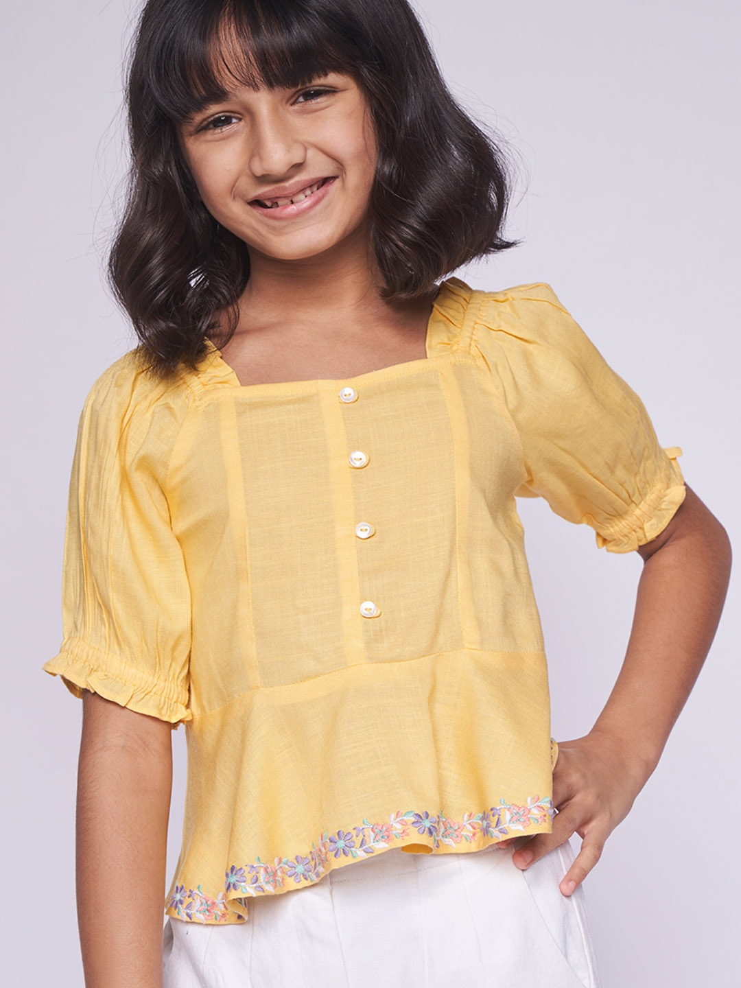 

Global Desi Girls Yellow Solid Square Neck Puff Sleeves Embroidered Smocked Peplum Top