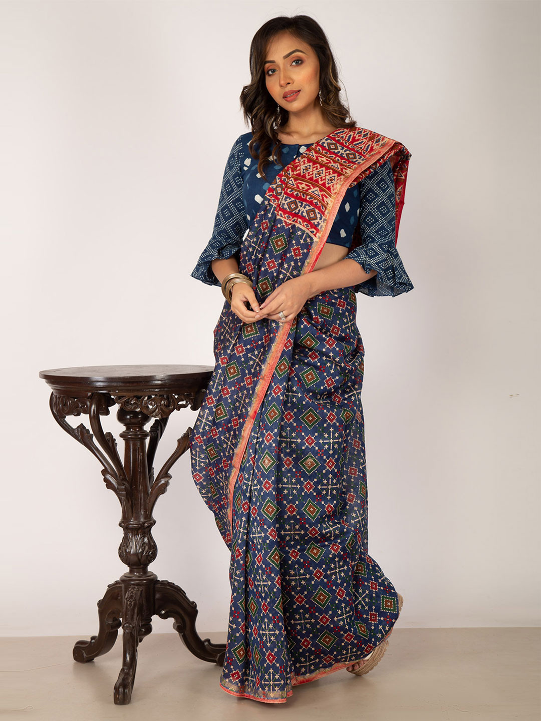 

Unnati Silks Blue & Red Ethnic Motifs Silk Cotton Chanderi Saree
