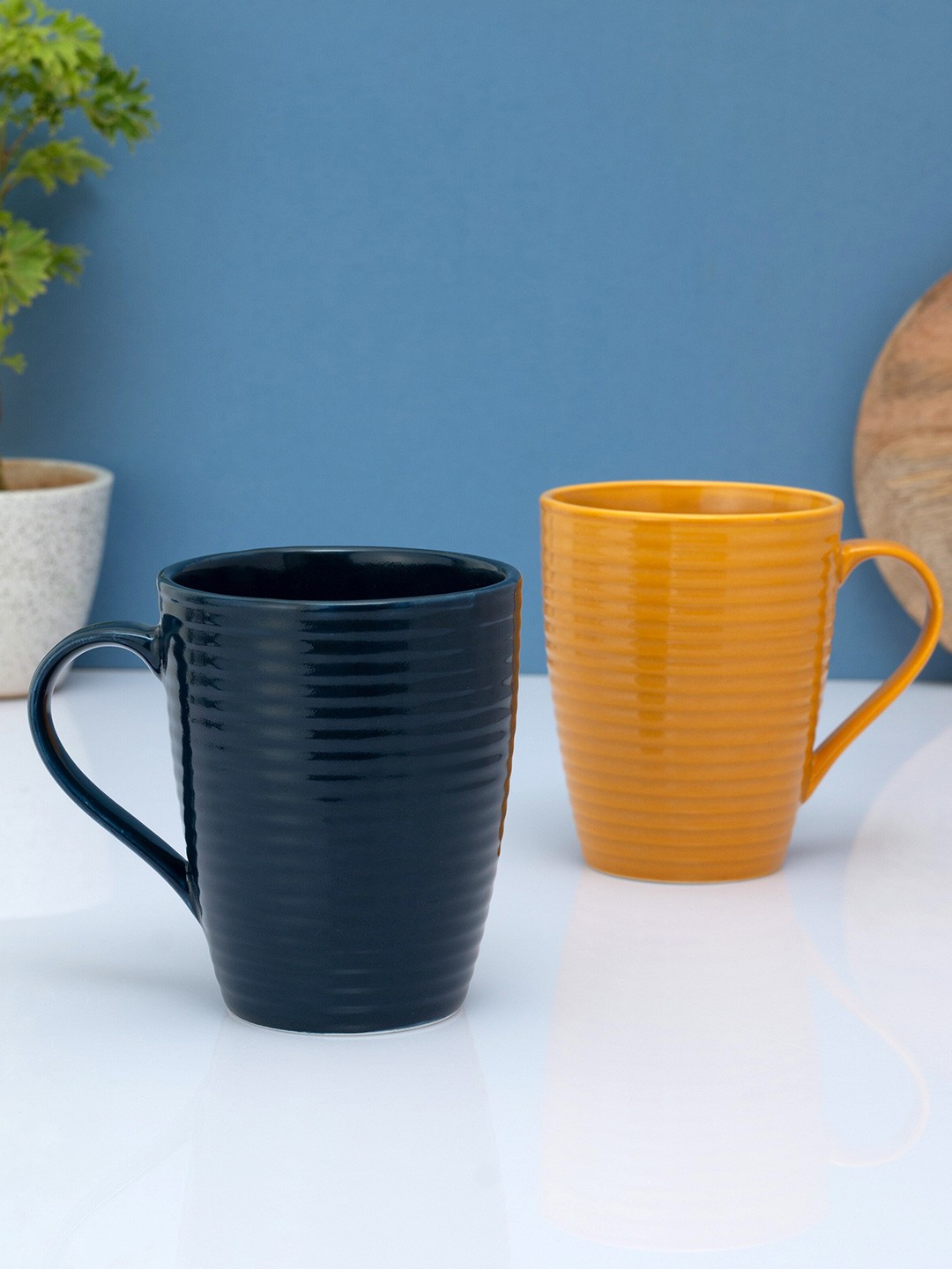 

CLAY CRAFT Set Of 2 Mustard & Black Textured Ceramic Glossy Mugs