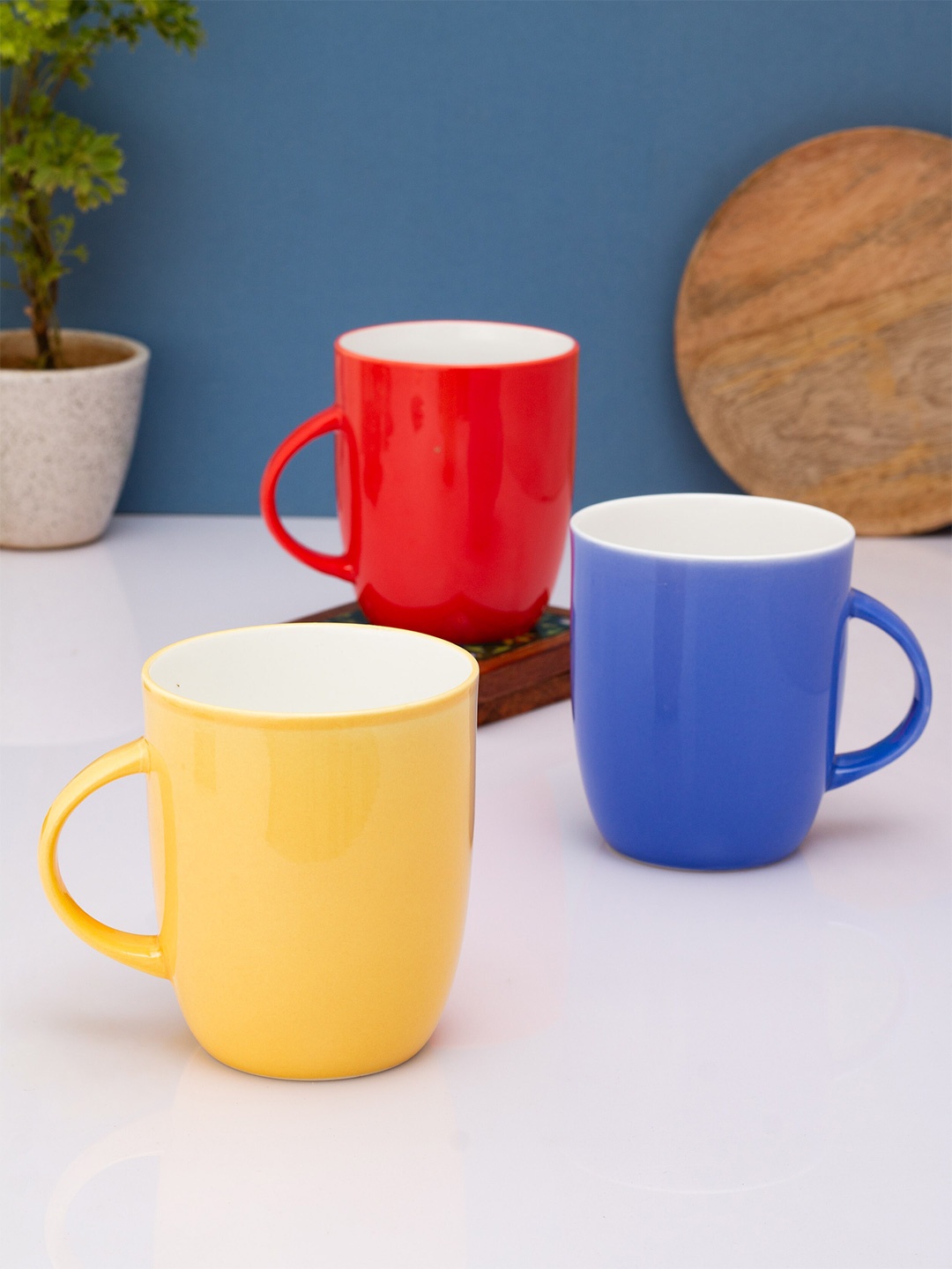 

CLAY CRAFT Set Of 3 Red & Blue Solid Ceramic Glossy Mugs