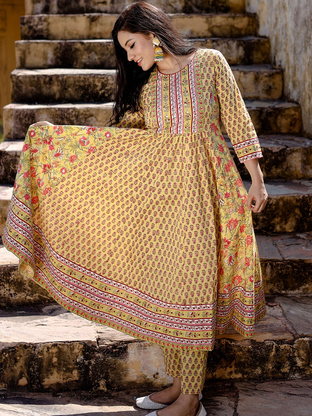 

Divena Women Yellow Floral Printed Sequinned Pure Cotton Kurta with Trousers