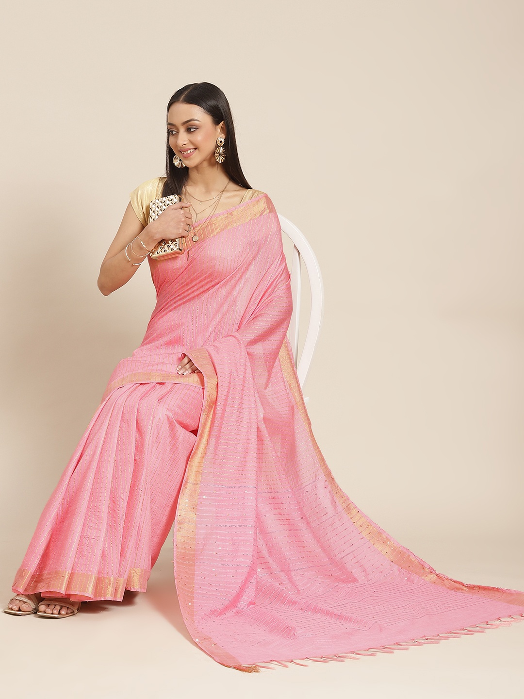 

BharatSthali Peach Striped Woven Design Saree with Woven Design Border and Sequinned Pallu