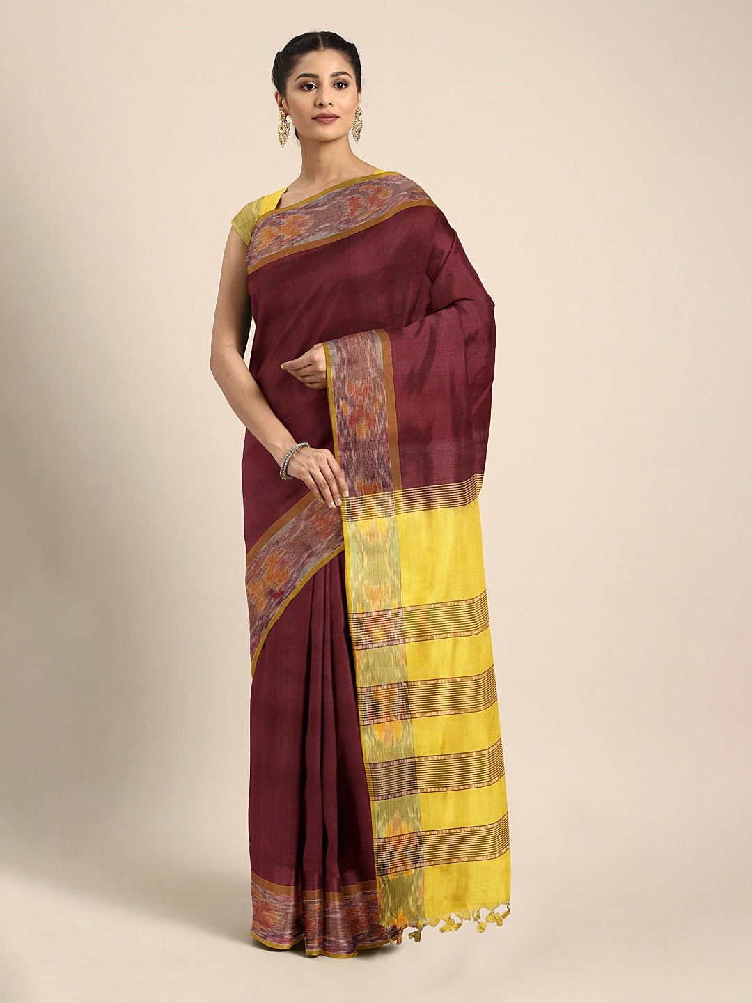 

Kalakari India Brown & Yellow Solid Tissue Uppada Saree
