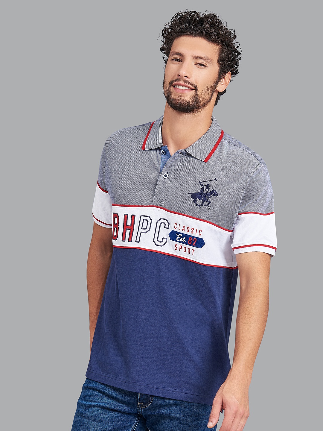 

Beverly Hills Polo Club Men Navy Blue & Grey Colourblocked Polo Collar T-shirt