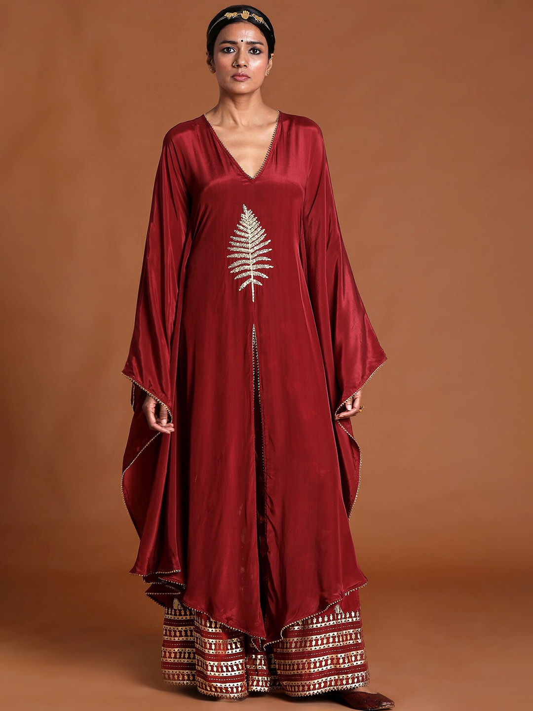 

Masaba Women Maroon Ethnic Motifs Thread Work Kaftan Kurta with Palazzos