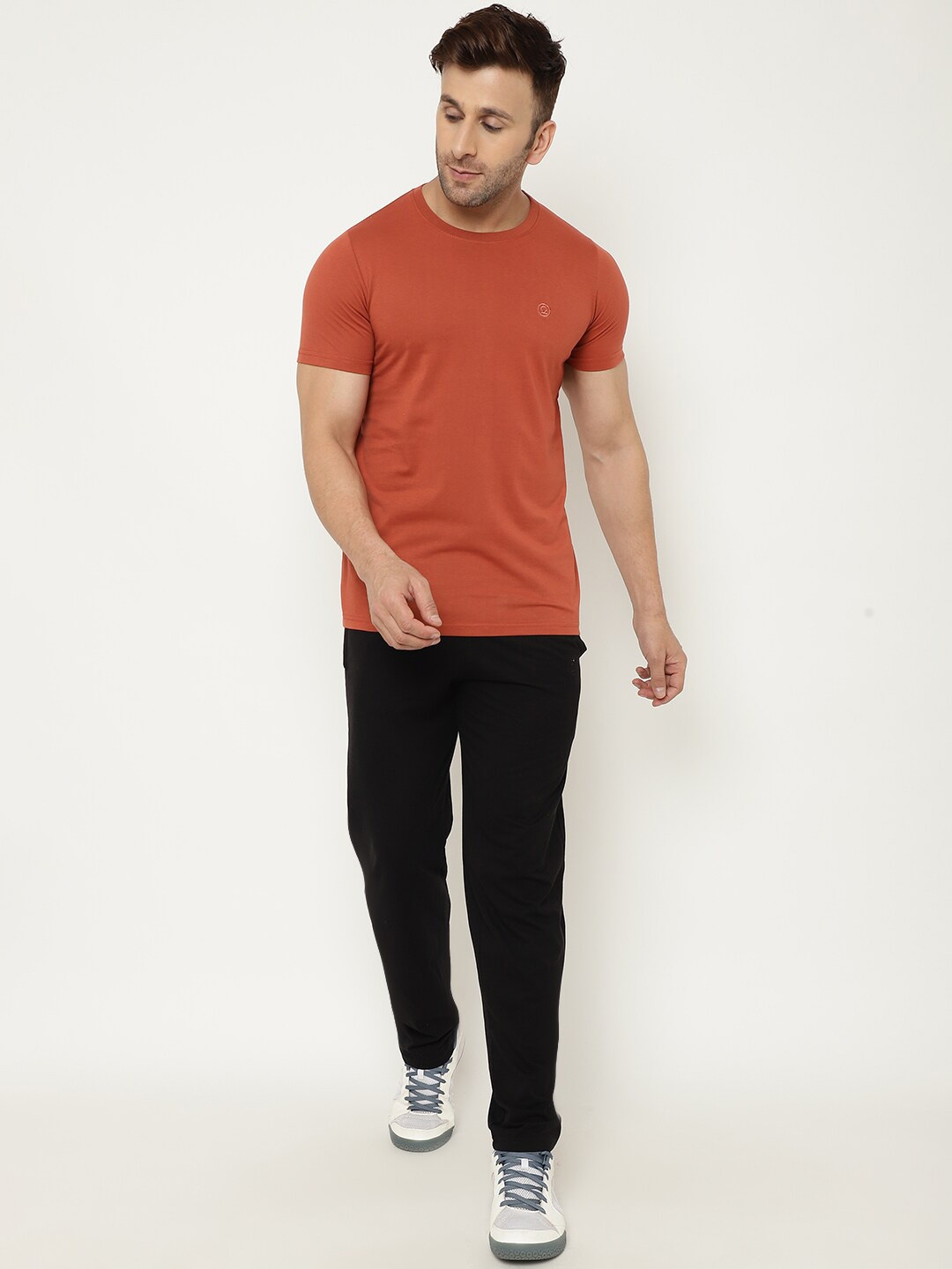 

Chkokko Men Orange & Black Solid Cotton Tracksuit