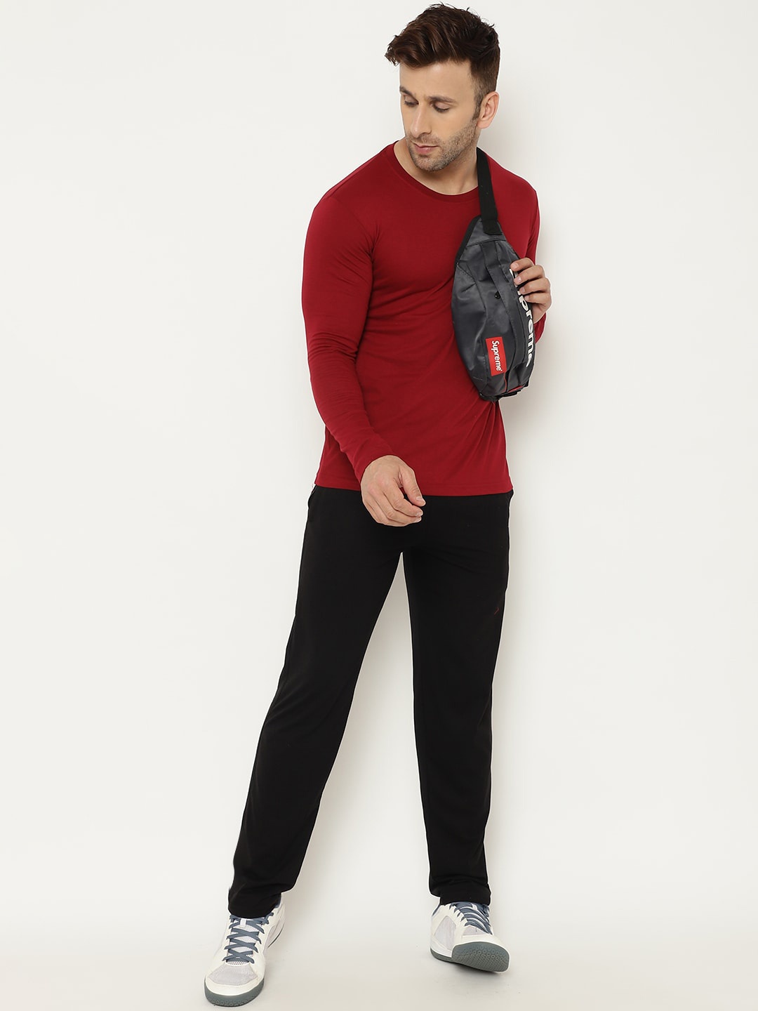 

Chkokko Men Maroon & Black Solid Tracksuit