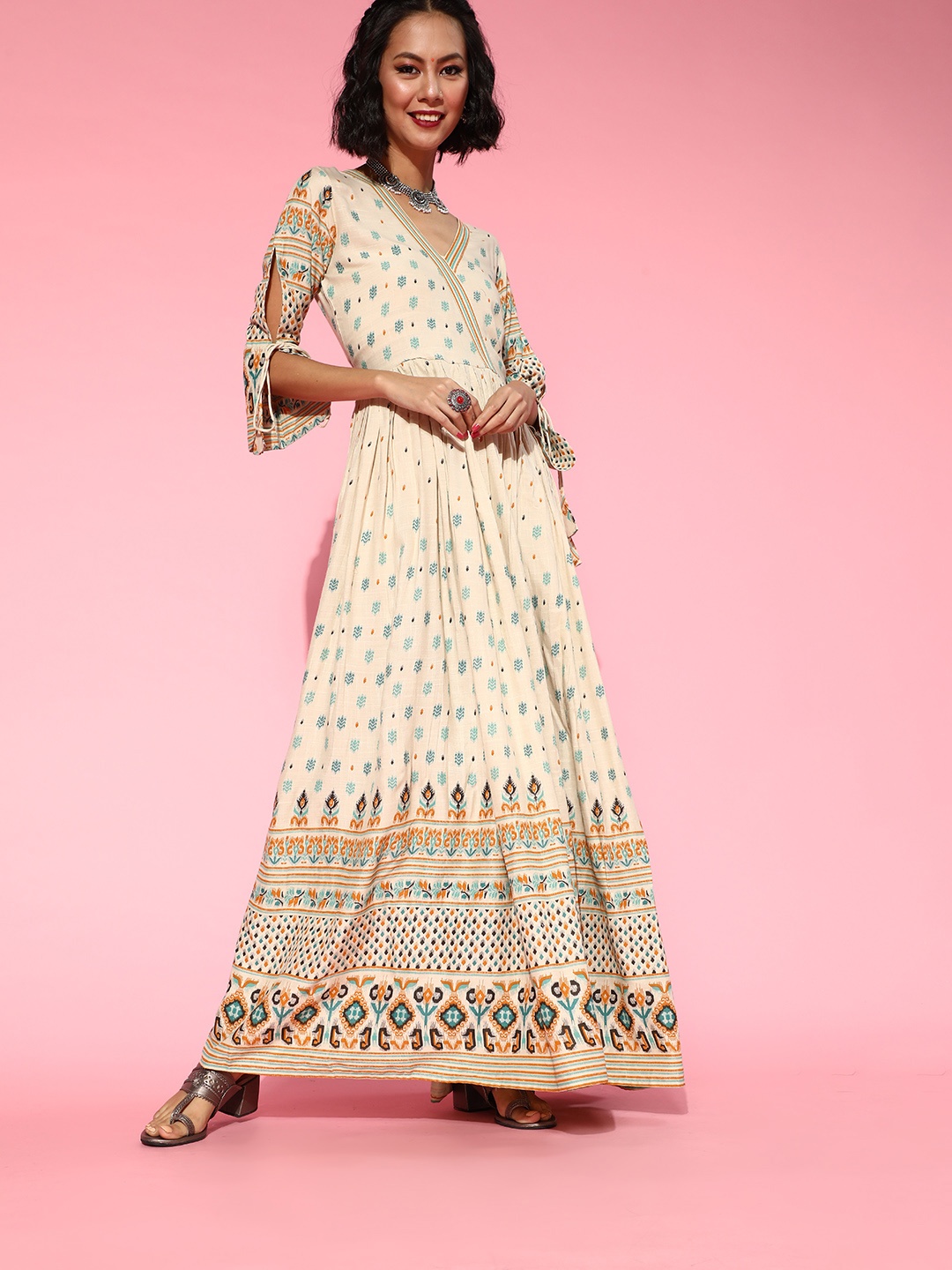 

mokshi Women Classy Beige Geometric Gown for Days