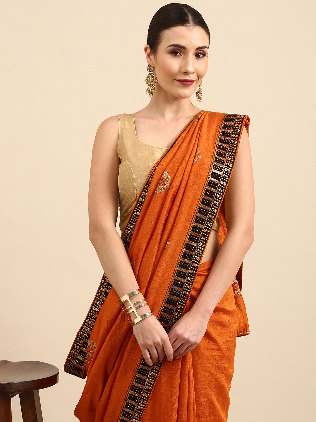 

Anouk Orange & Golden Ethnic Embroidered Bhagalpuri Saree