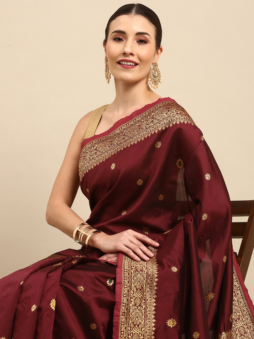 

Anouk Maroon & Golden Ethnic Woven Design Silk Blend Saree