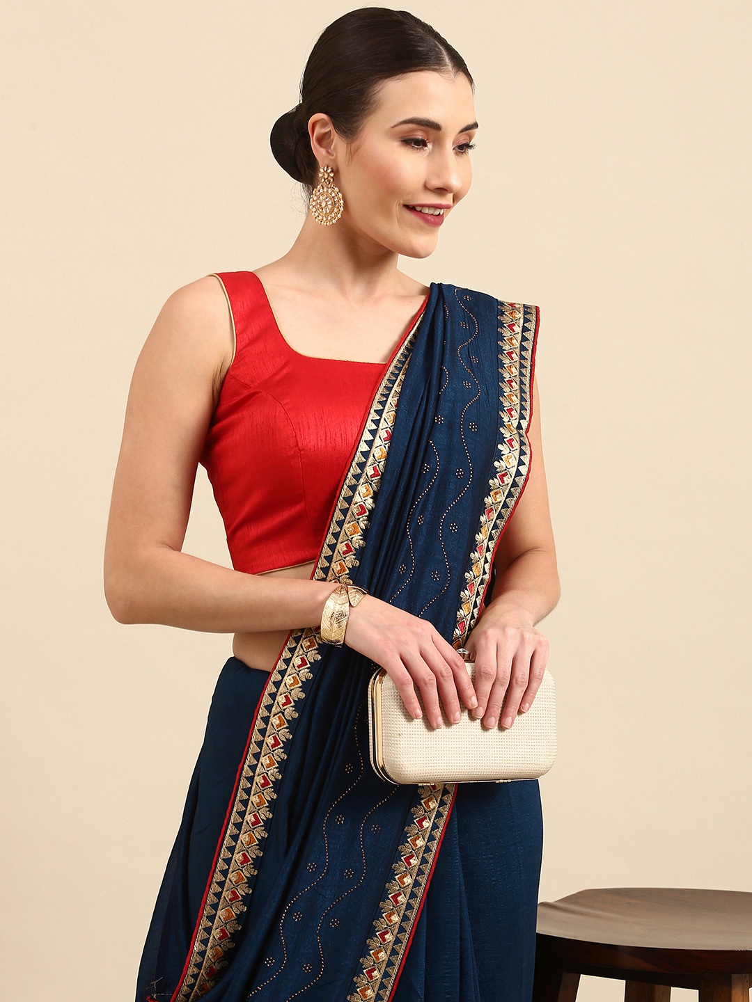 

Anouk Teal Blue Solid Bhagalpuri Saree