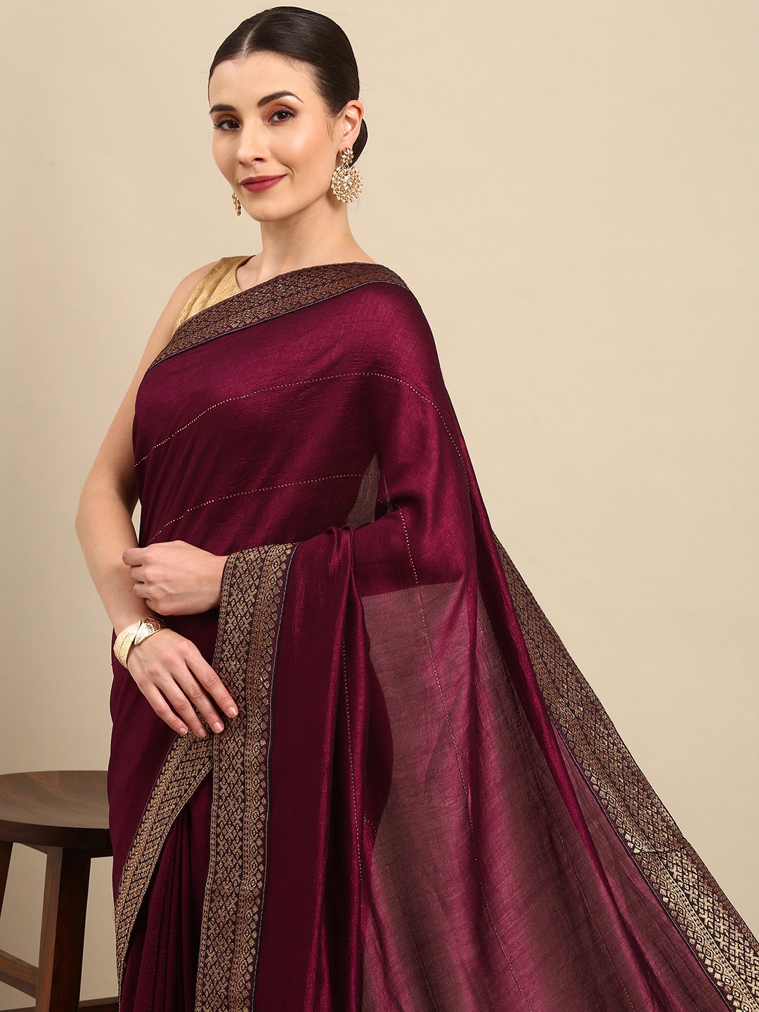 

Anouk Burgundy Striped Bhagalpuri Saree