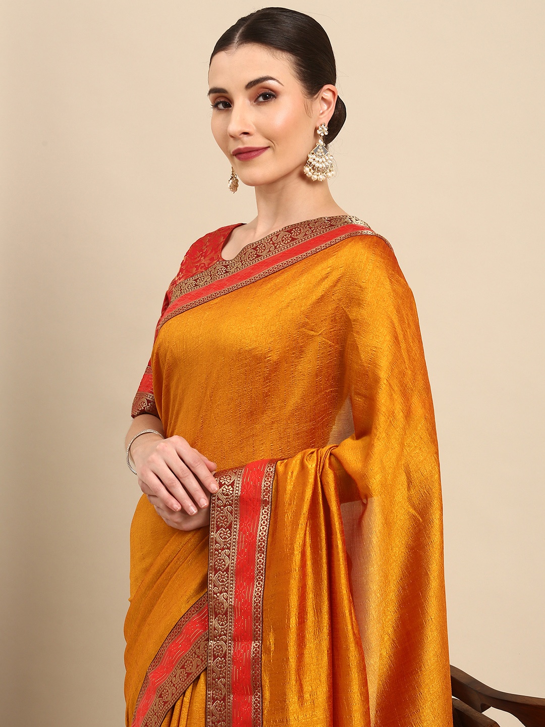 

Anouk Mustard Yellow Solid Bhagalpuri Saree