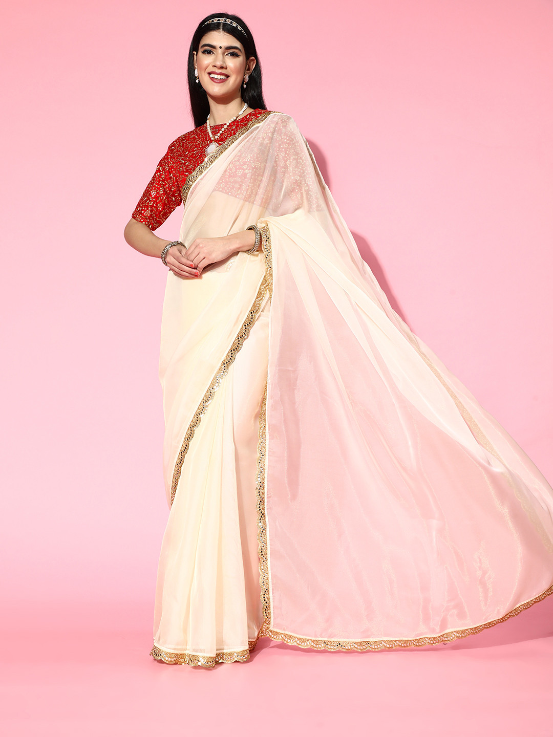 

Inddus Women Classic Cream Embellished Organza Saree with Silk Blend Blouse Piece