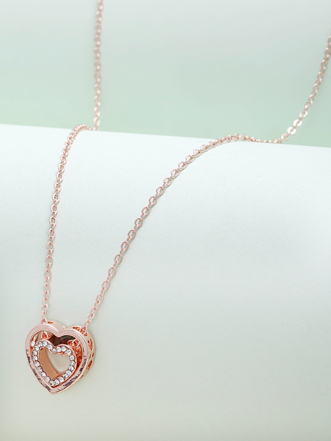 

Ferosh Rose Gold-Toned Lucent Heart Shaped Pendant With Chain