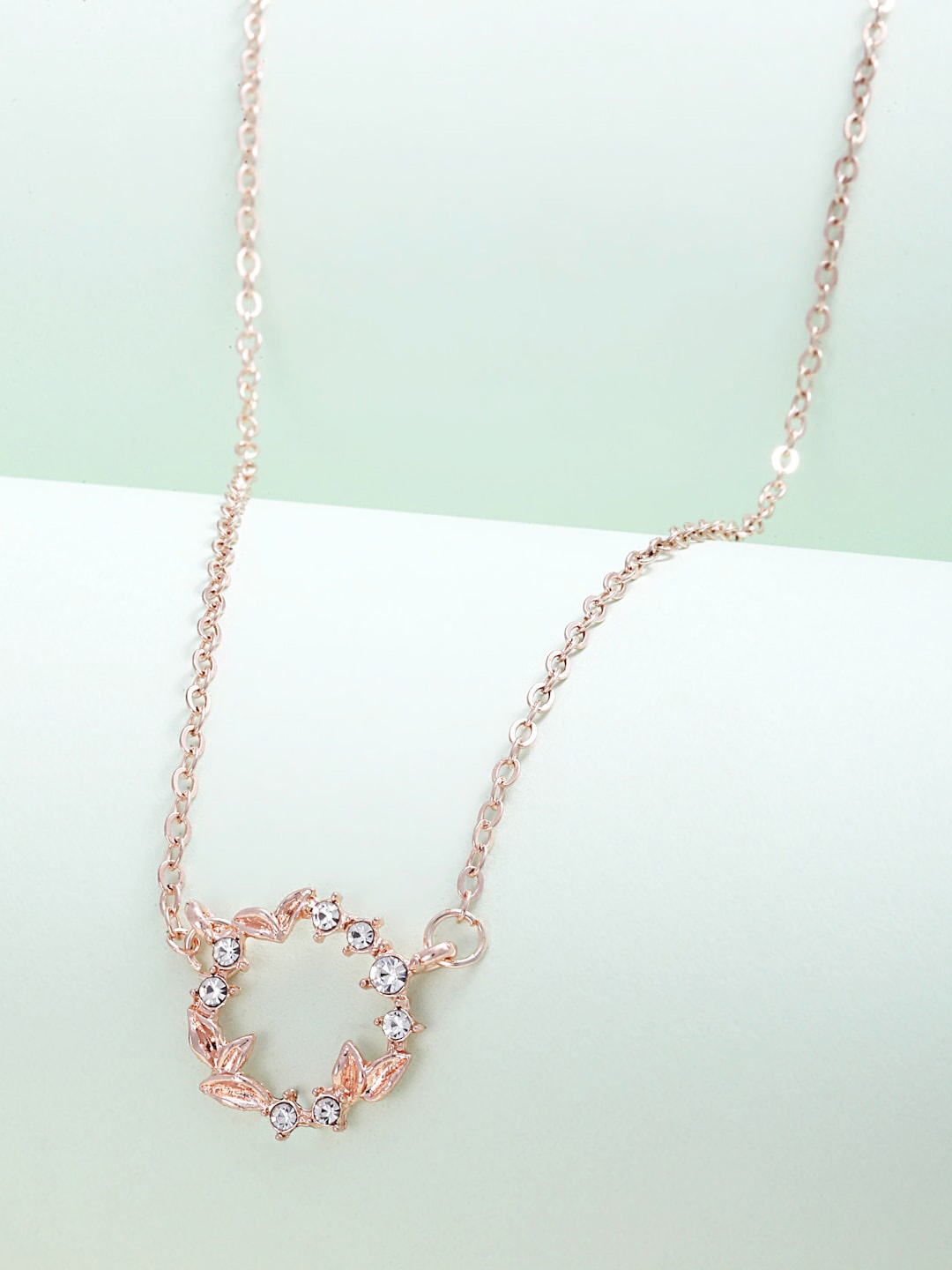 

Ferosh Women Rose Gold-Plated Stone Studded Wreath Pendant with Chain