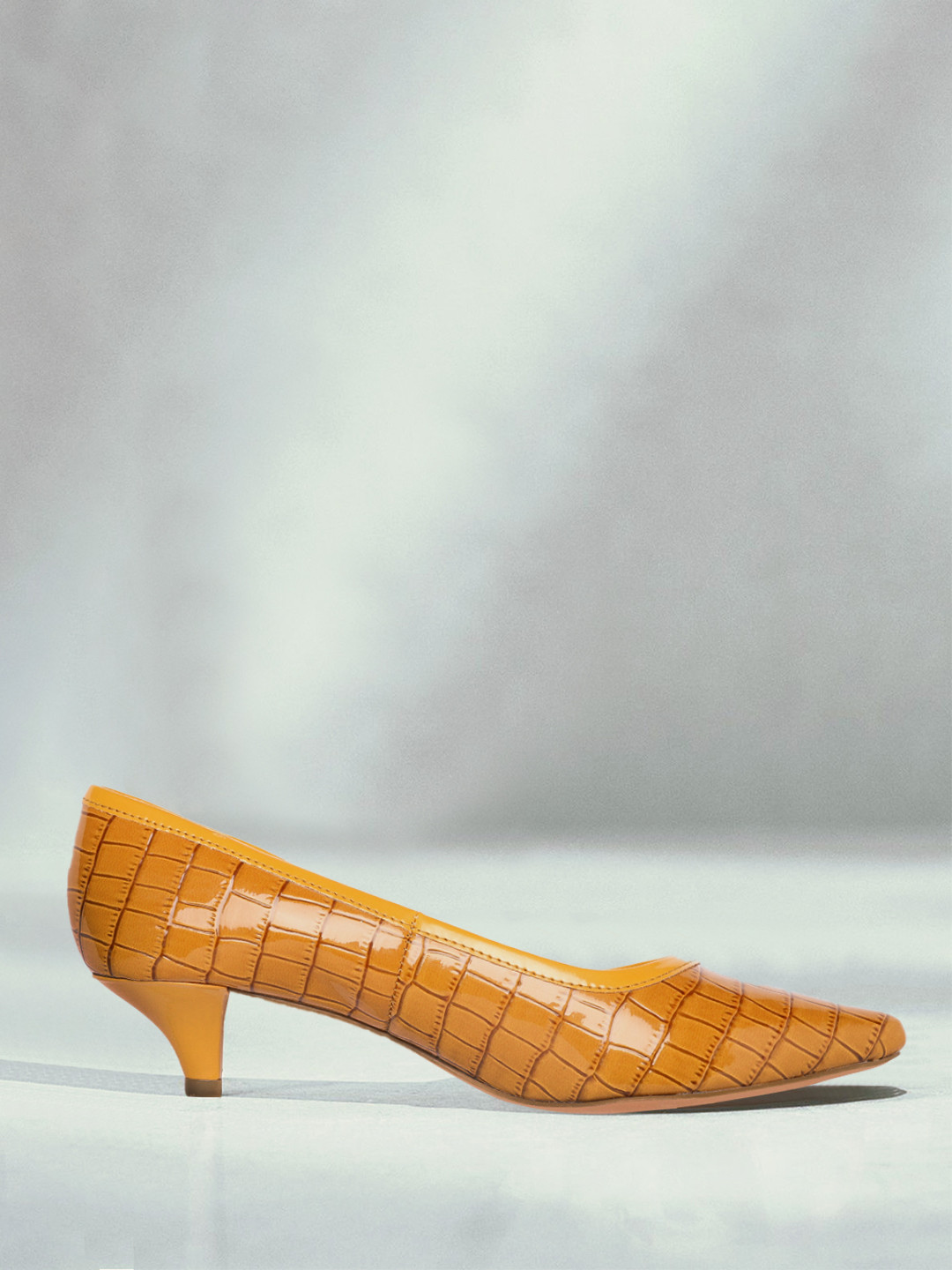 

Carlton London Women Mustard Yellow Croc Textured Pumps