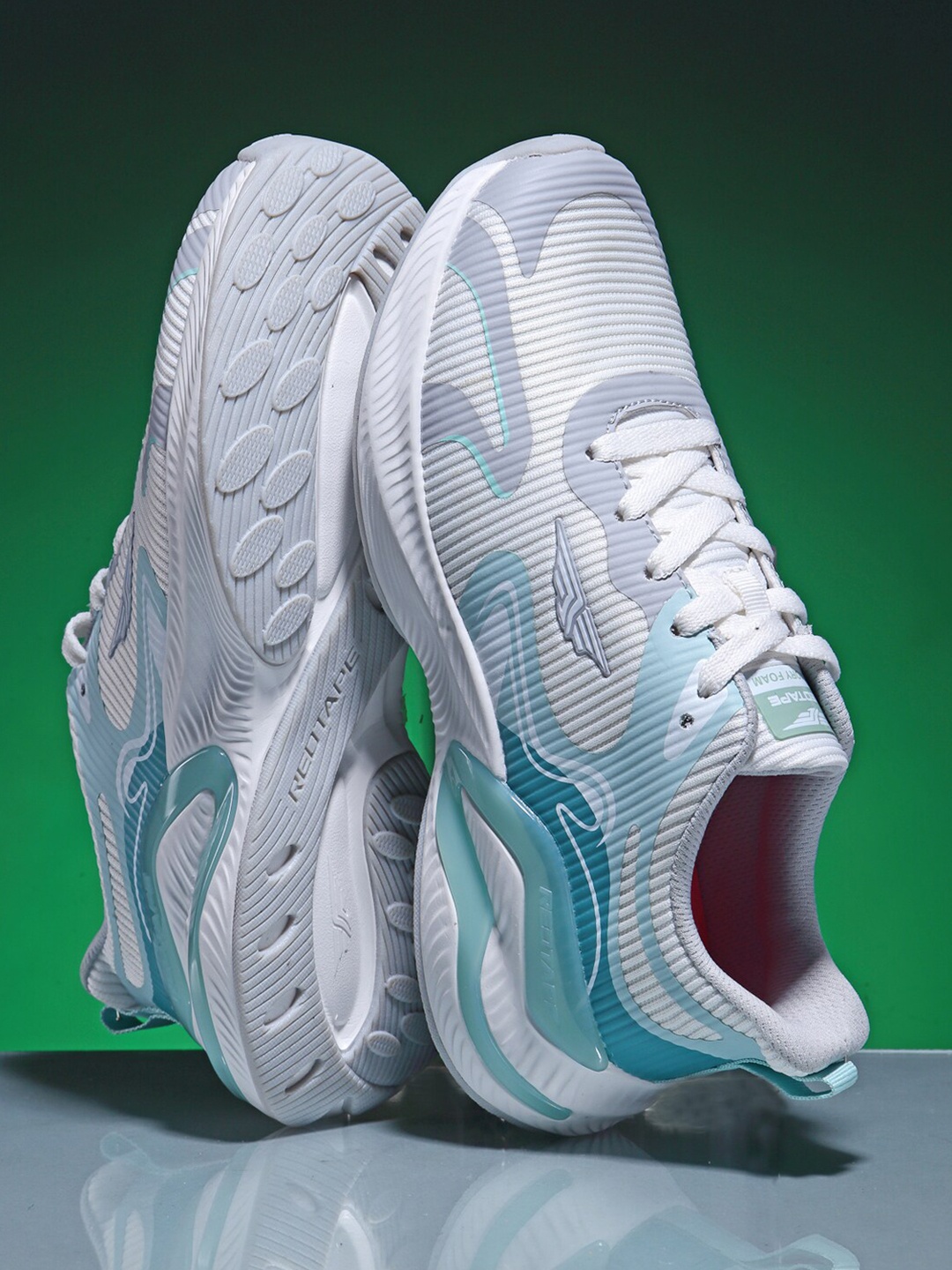

Red Tape Women White & Blue Printed Running Shoes