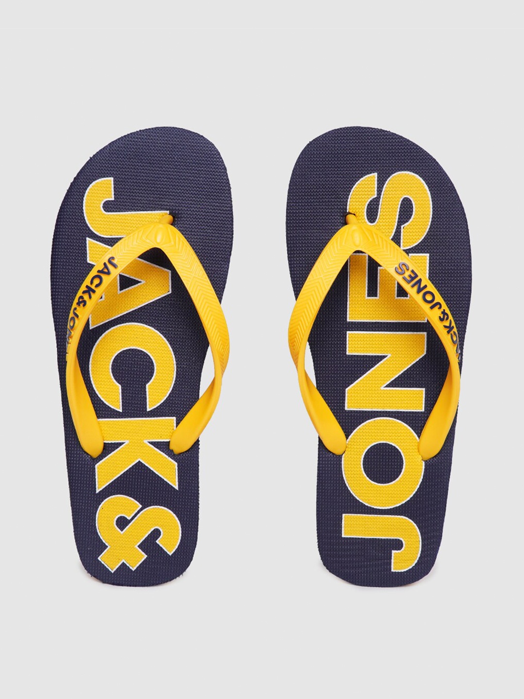 

Jack & Jones Men Navy Blue & Yellow Printed Thong Flip-Flops