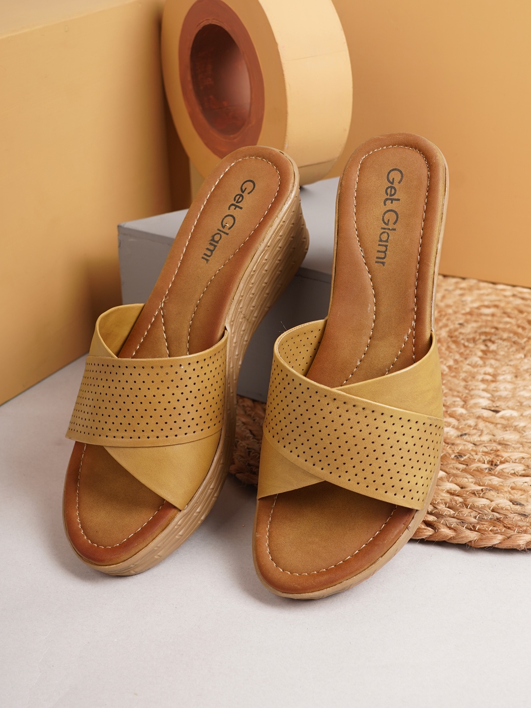

Get Glamr Beige Textured Wedge Mules