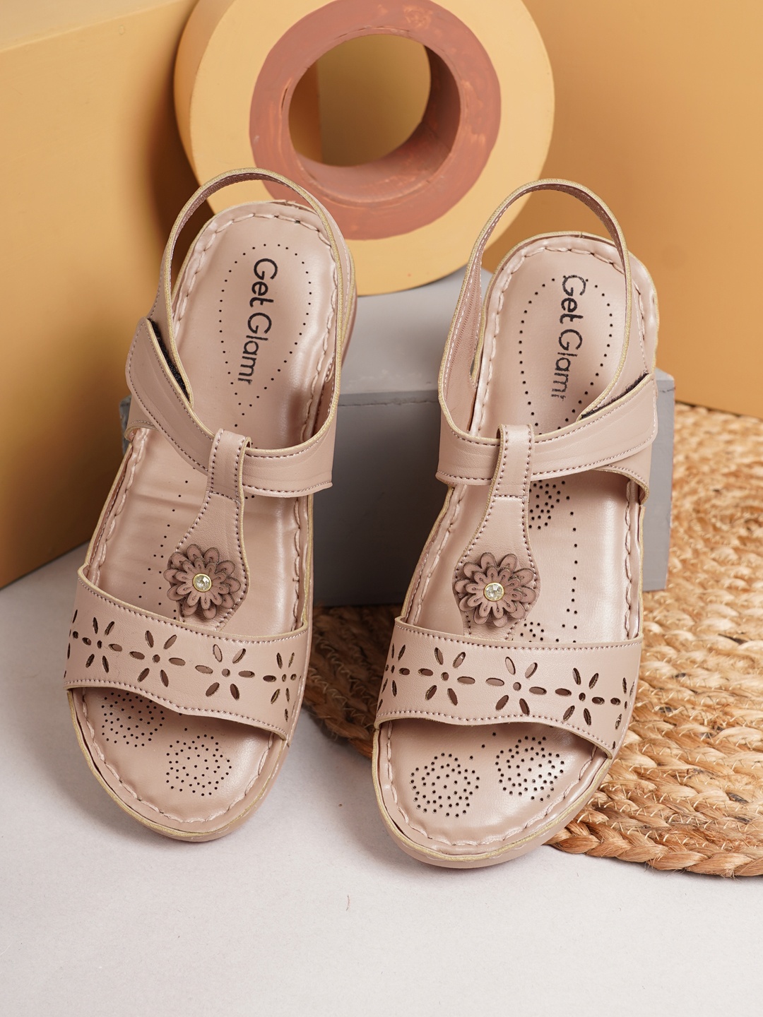 

Get Glamr Peach-Coloured Printed Flatform Mules with Laser Cuts