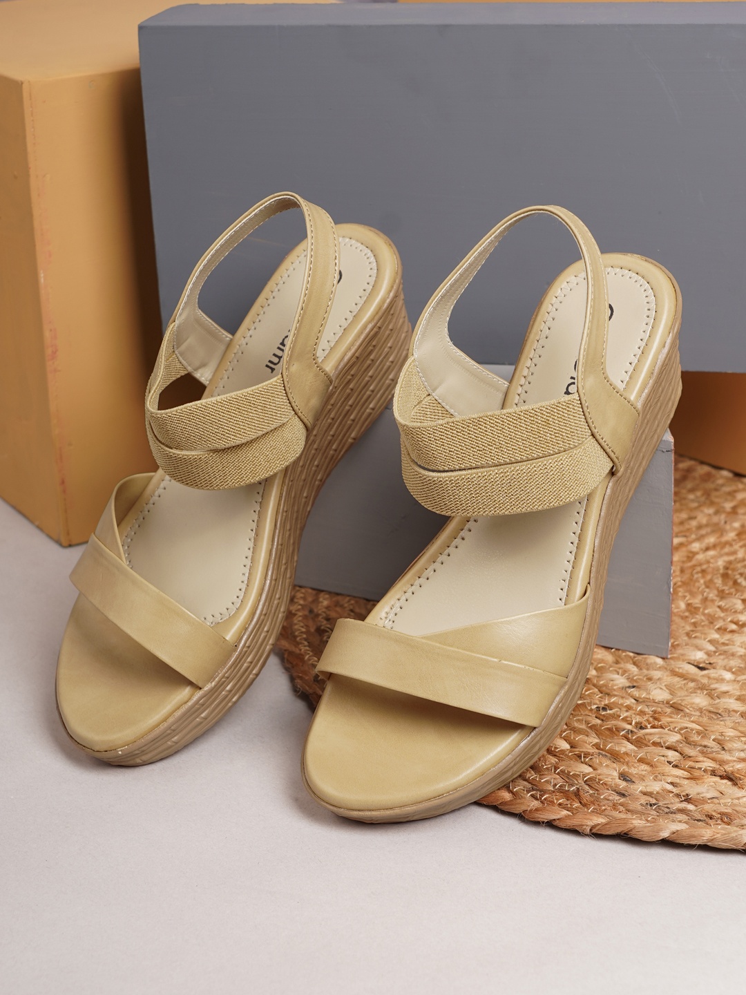 

Get Glamr Beige Synthetic Solid Wedge Heeled Sandals