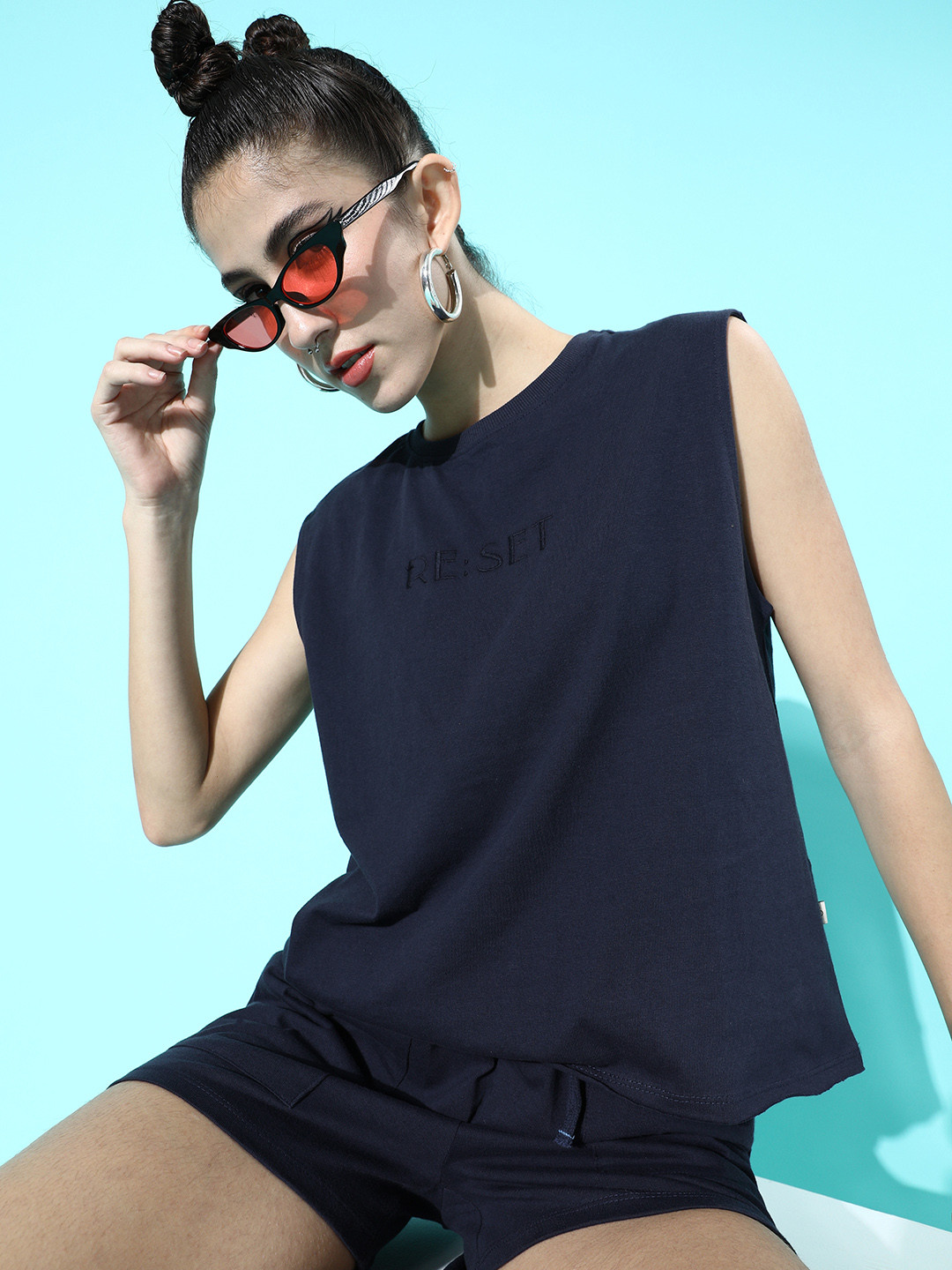 

Roadster Women Stylish Navy Blue Self-Design T-Shirt with Solid Shorts