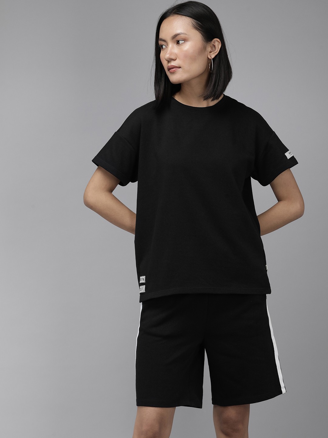 

Roadster The Lifestyle Co Women Black Solid Co-ord Set With Side stripes