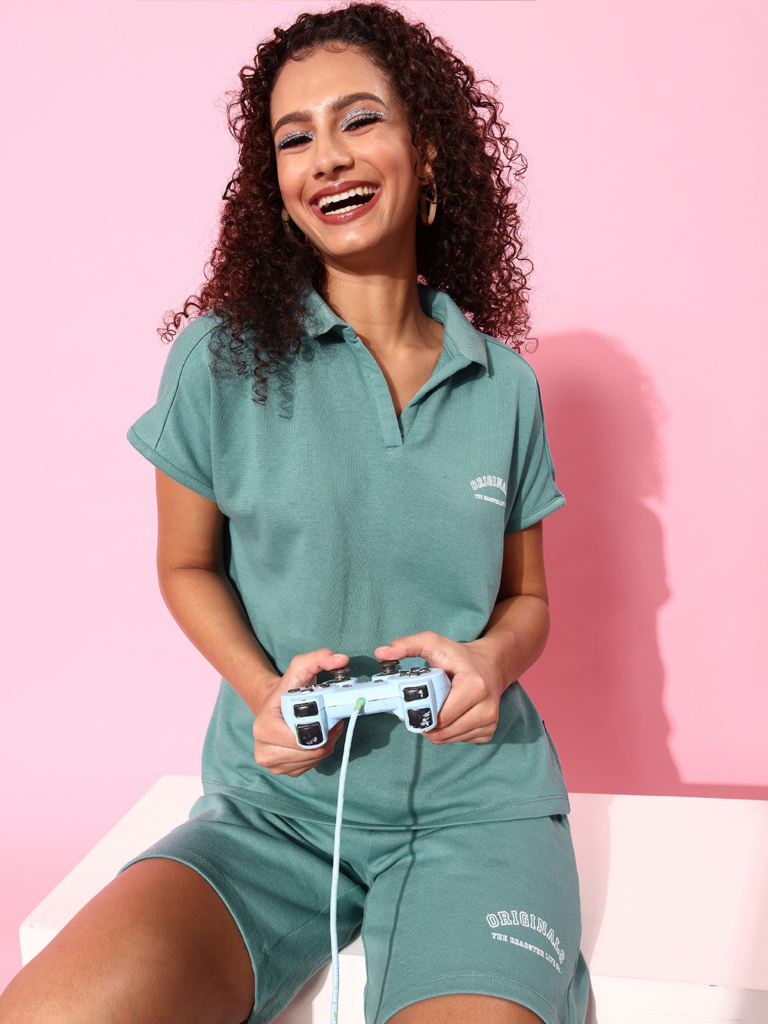 

Roadster Women Turquoise Blue Solid T-Shirt with Shorts