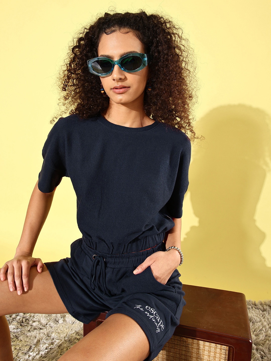 

Roadster Women Navy Blue Self-Design Top with Solid Shorts