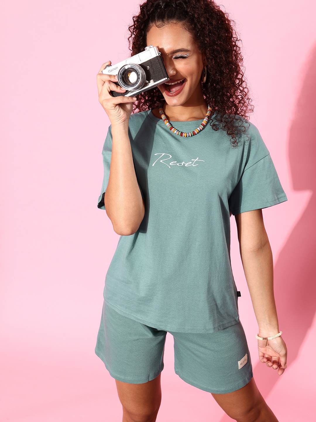 

Roadster Women Teal Printed T-Shirt with Solid Shorts