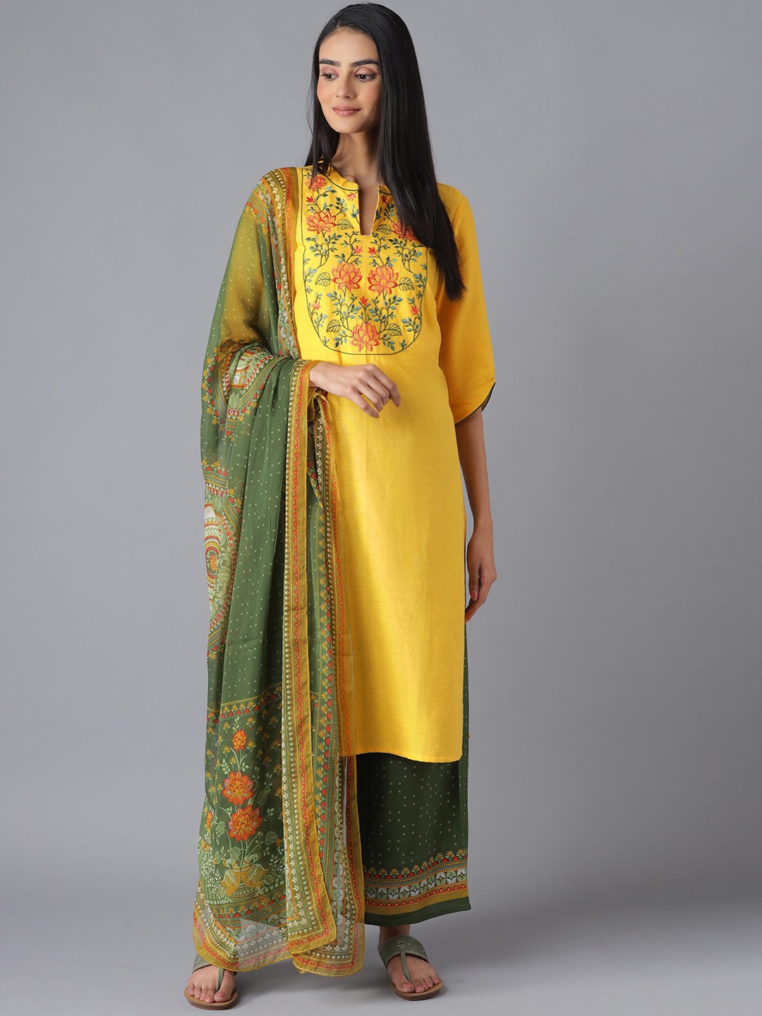 

AURELIA Women Yellow Floral Embroidered Kurta with Palazzos & With Dupatta