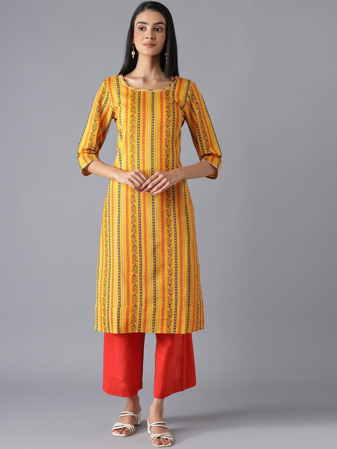 

AURELIA Women Yellow Striped Kurti with Trousers